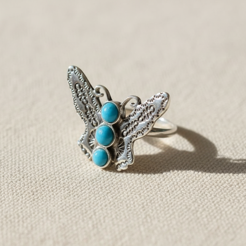 Turquoise Butterfly Ring on Canvas